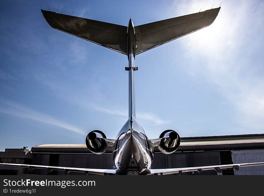 Aircraft from behind at hangar