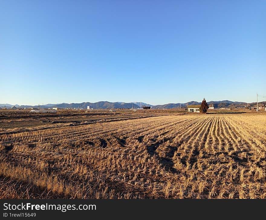 Beautiful blue sky view on the farmland during winter in Gifu village Japan