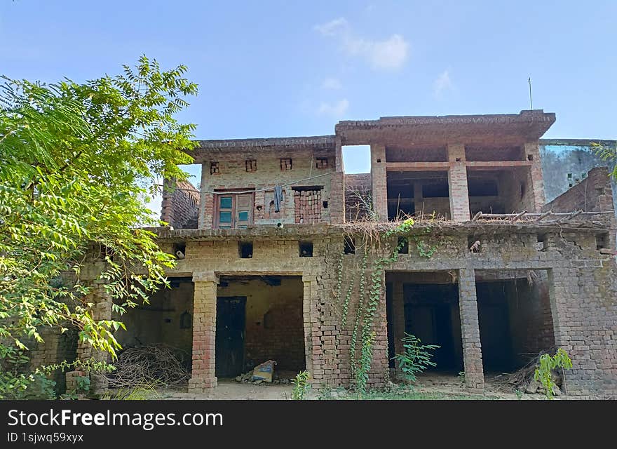 abandoned brick house in a rural area of India