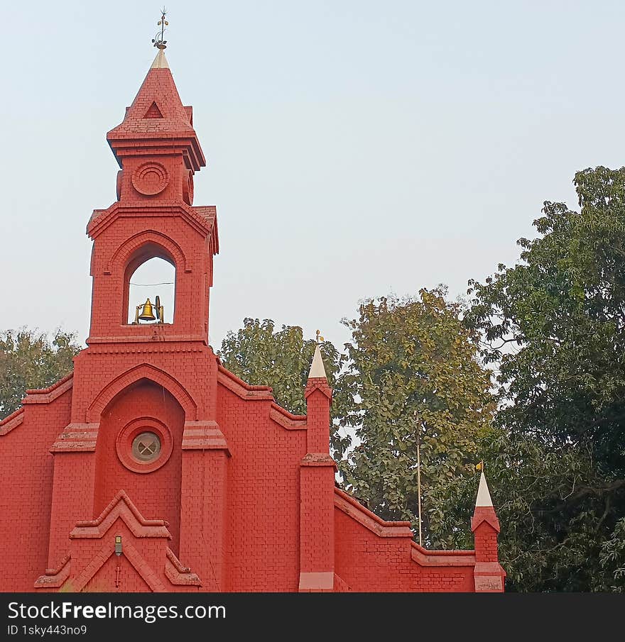 Red Brick Church with a golden bell