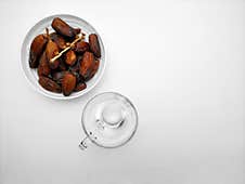 Dried Dates And A Glass Of Water Stock Image