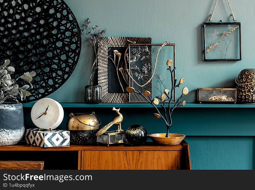 Stylish and retro composition of elegant personal accessories and beautiful decoration. Modern and retro concept of living room.