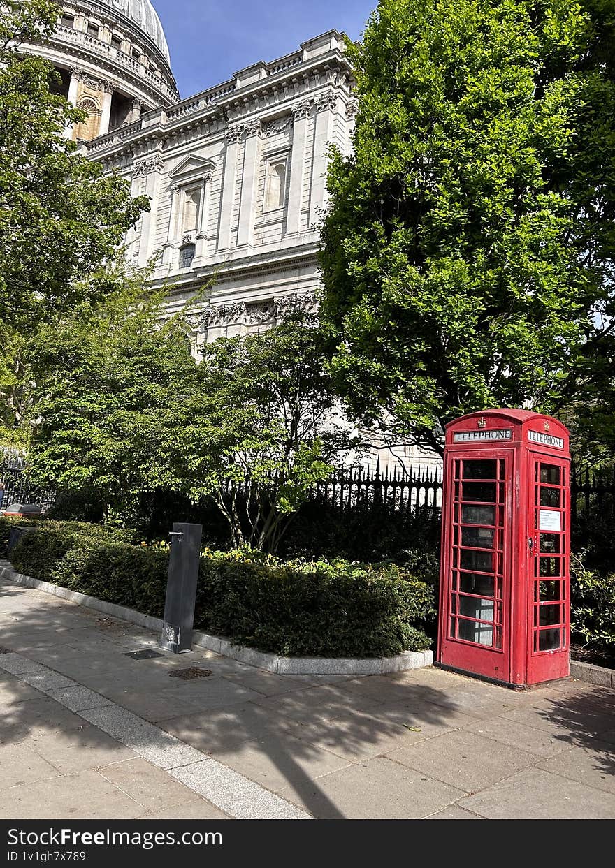 london telephone booth spring sun