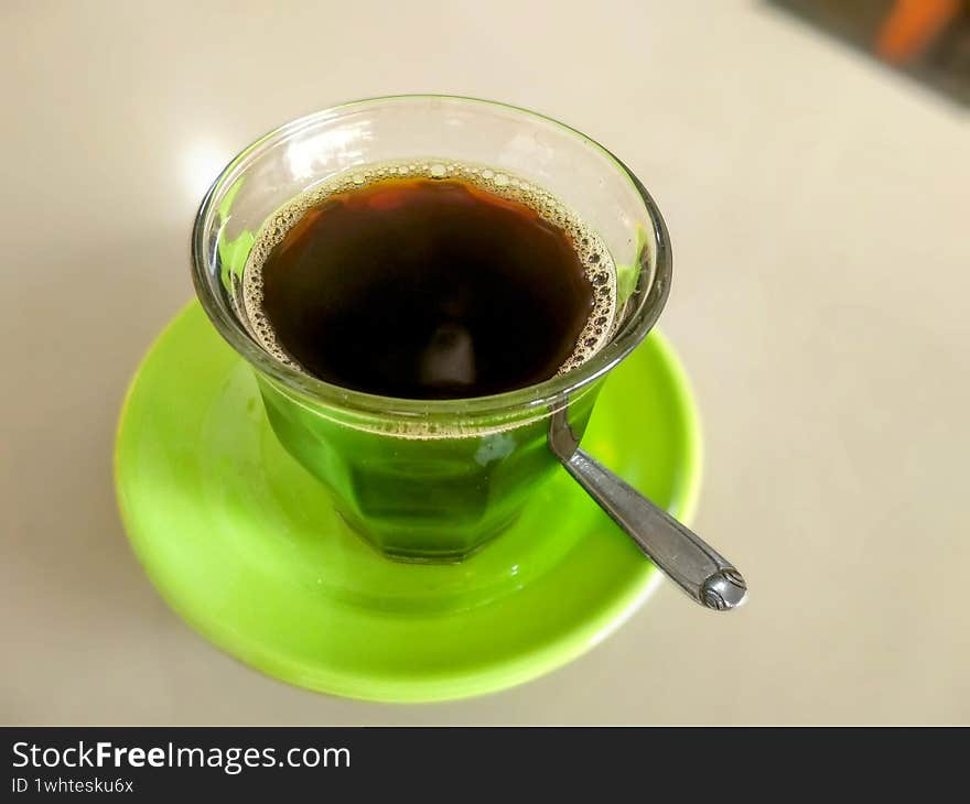 wonderful morning coffee cup on a green saucer