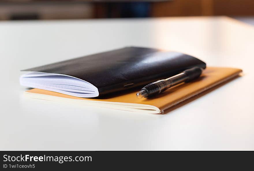 A clean and organized overhead shot showcasing a selection of essential tools commonly used for writing, note-taking, and brainstorming ideas. A clean and organized overhead shot showcasing a selection of essential tools commonly used for writing, note-taking, and brainstorming ideas.