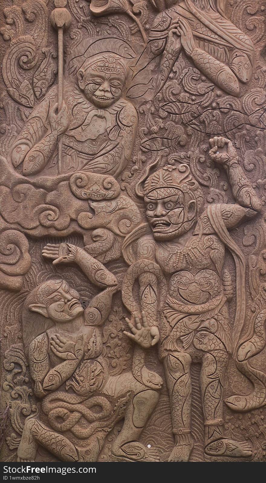 Asian mythology stone sculpture wall