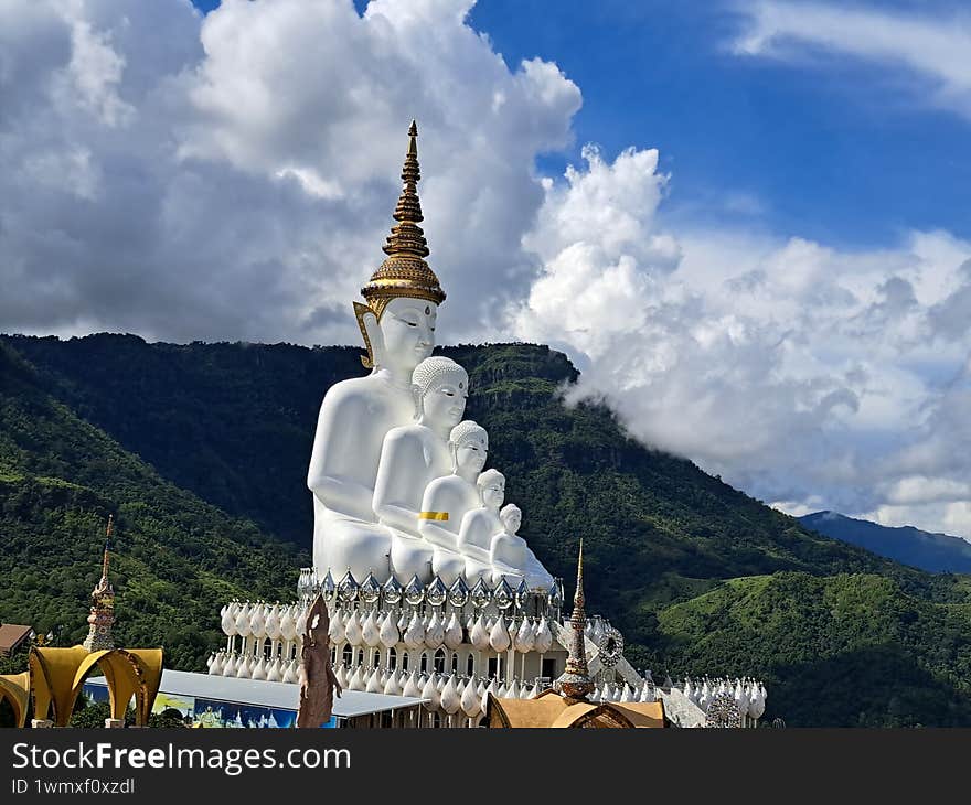 Buddha statues in front of mountain and sky Kao kho Phetchabun Thailand