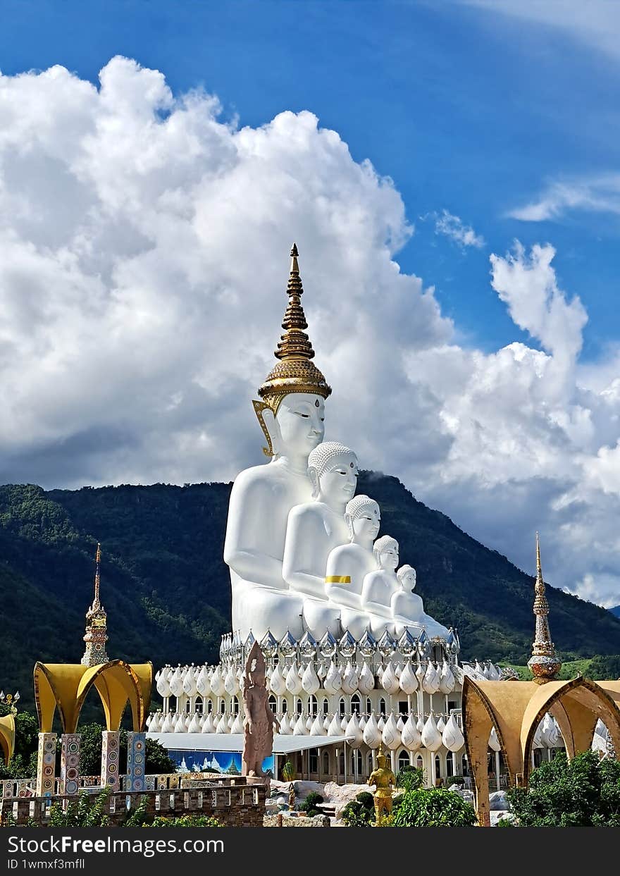 Buddha statues in front of mountain and sky Kao kho Phetchabun Thailand