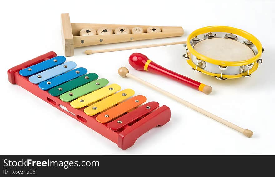 Bright and colorful illustration of kids musical instruments including a xylophone, tambourine, drum, and recorder. Set against a cheerful background with a rainbow, music notes, and playful elements, this image represents fun, creativity, learning, and childhood joy. Perfect for educational themes, children�s activities, and music-related content.