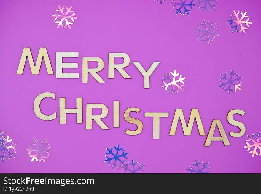 merry christmas write between snowflakes