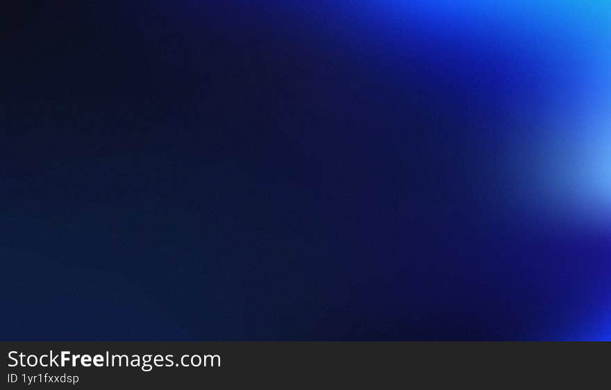 A dark, grainy background transitions from deep navy to vibrant electric blue on the right, culminating in a soft, bright light flare. A dark, grainy background transitions from deep navy to vibrant electric blue on the right, culminating in a soft, bright light flare