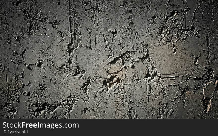A rough and textured concrete wall background with a gritty grunge style in shades of gray.