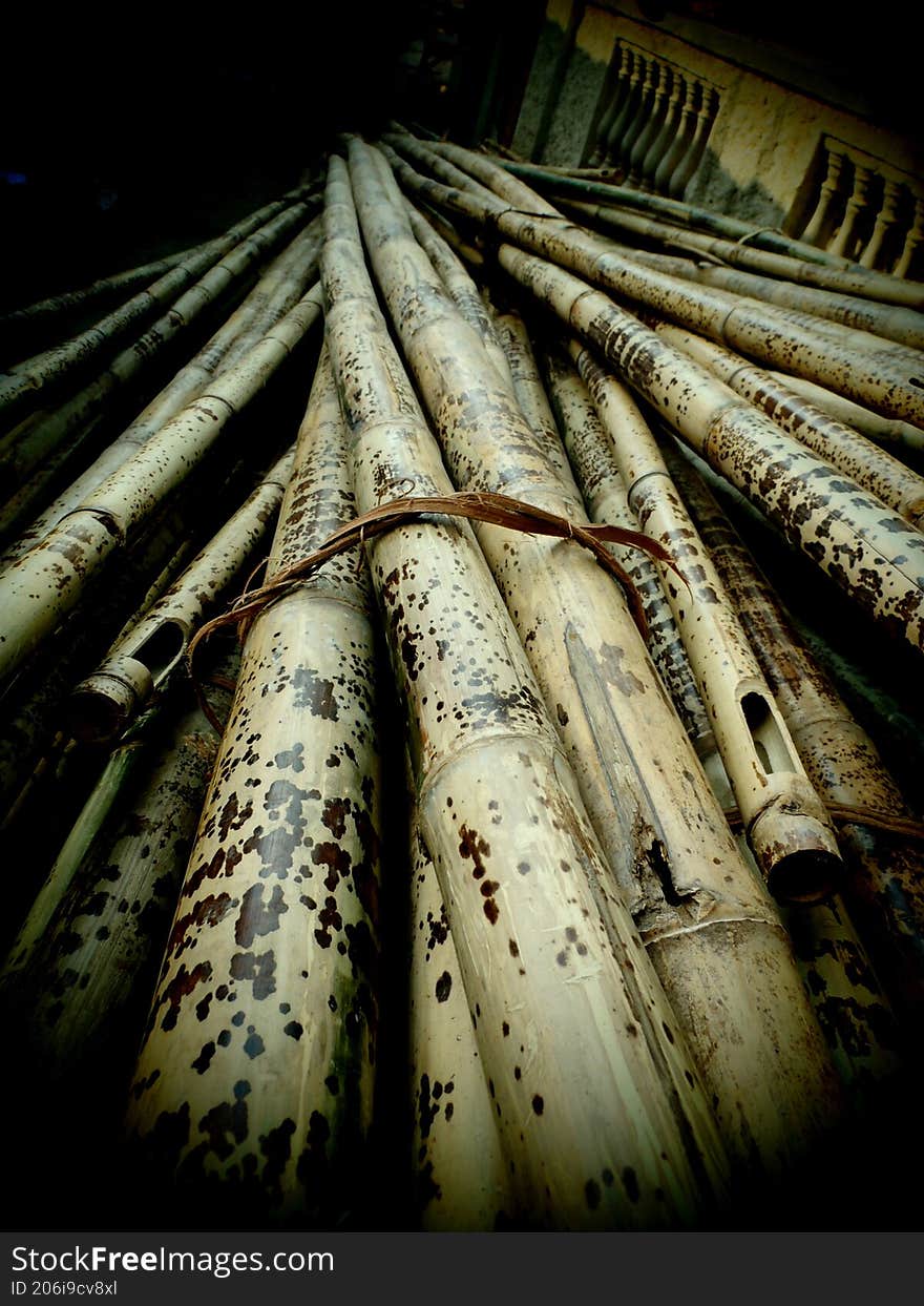 a pile of bamboo sticks with a unique pattern