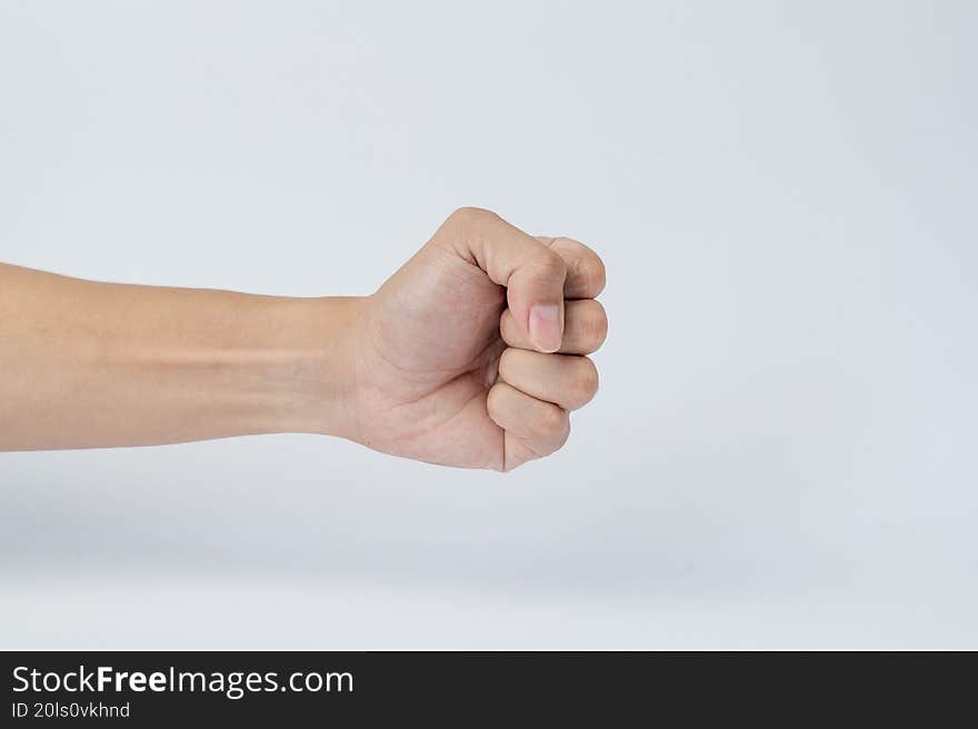 Hand showing closed fist gesture on white