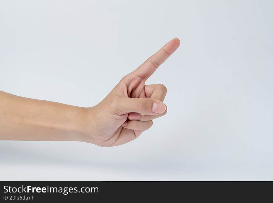 Hand pointing upward with index finger on white