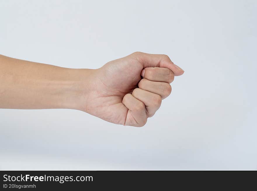 Hand showing closed fist on white background