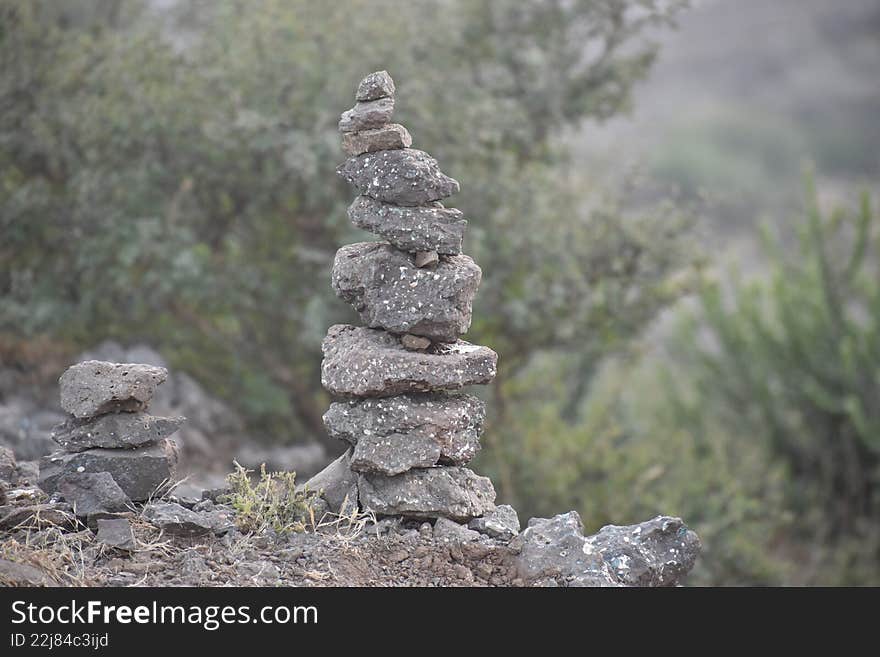High Stacked Stone Cairn in Natural Setting