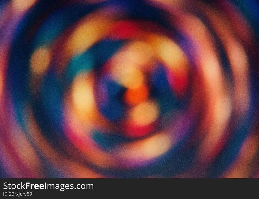 Vibrant psychedelic radial motion blur creates unique abstract background. Blue abstract vortex texture with circular design and g