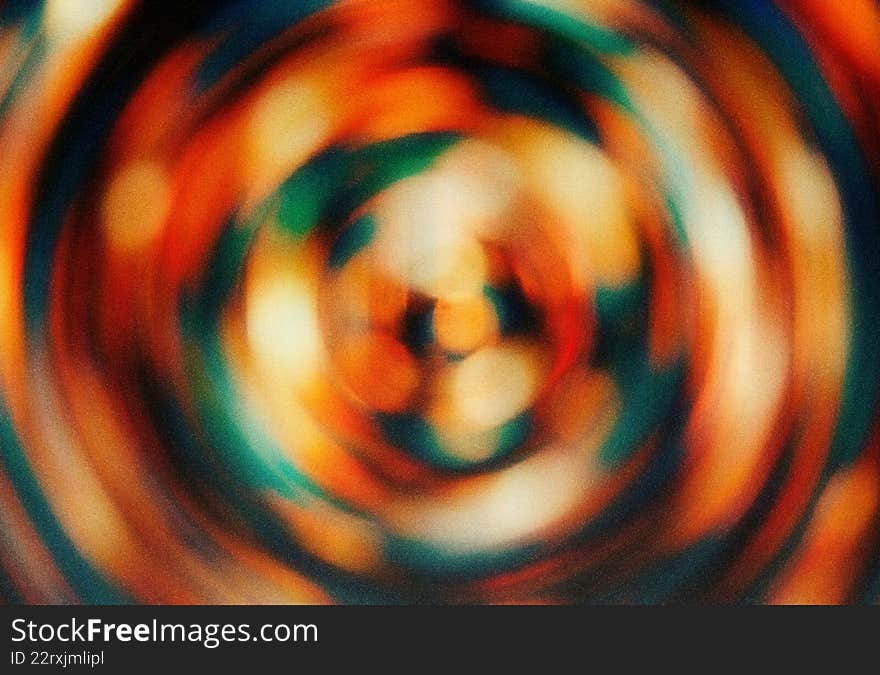 Vibrant psychedelic radial motion blur creates unique abstract background. Colorful abstract vortex texture with circular design a