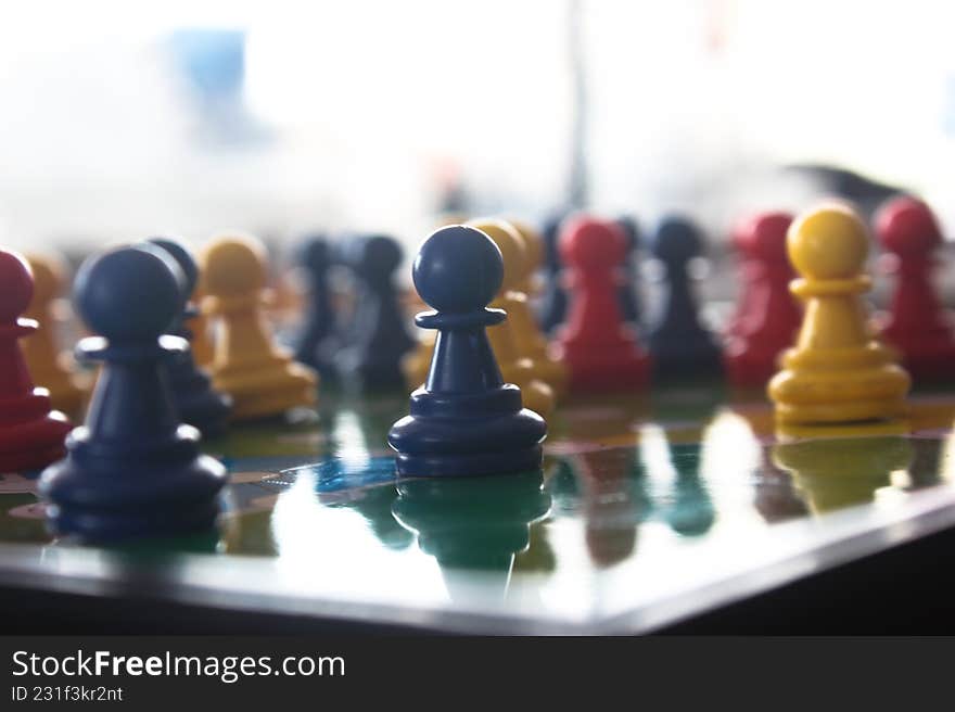 Colorful pieces from the Ludo board game