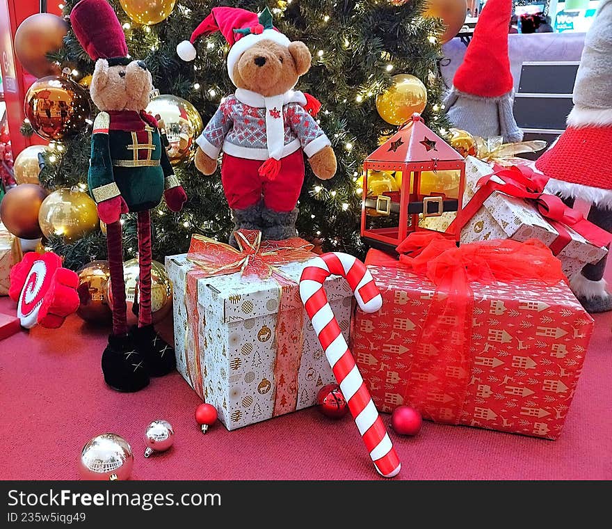 Christmas still life with a Christmas tree, teddy bears, and gifts