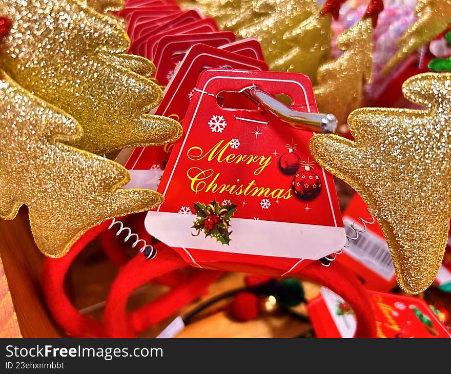 Red Christmas gift tags with golden bells and festive ornaments, featuring a Merry Christmas message for holiday gift wrapping.