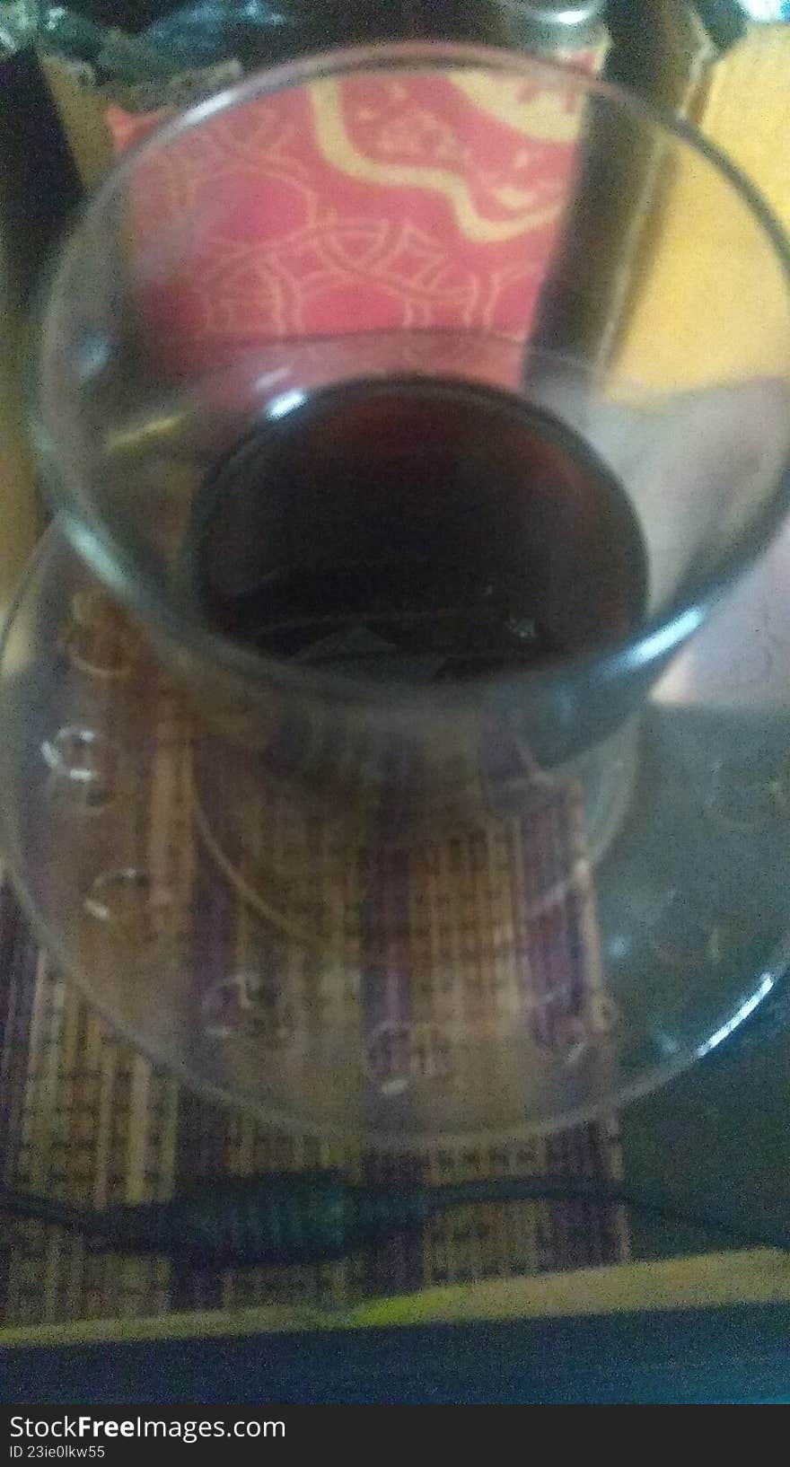 a cup of leftover coffee on the desk