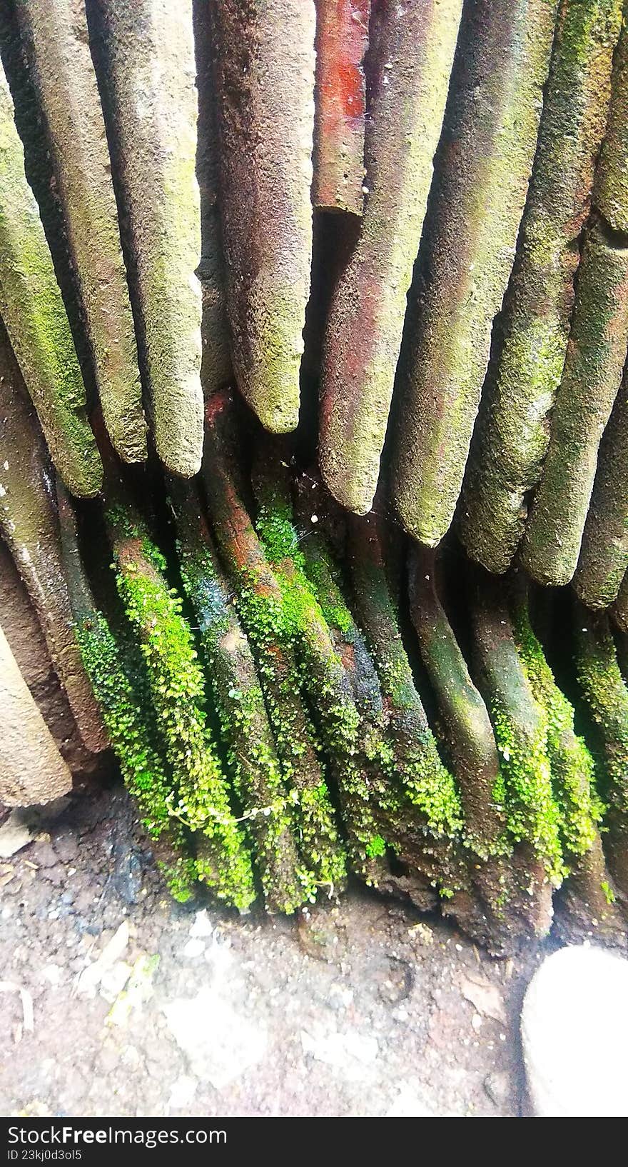 collection of old and damaged roof tiles