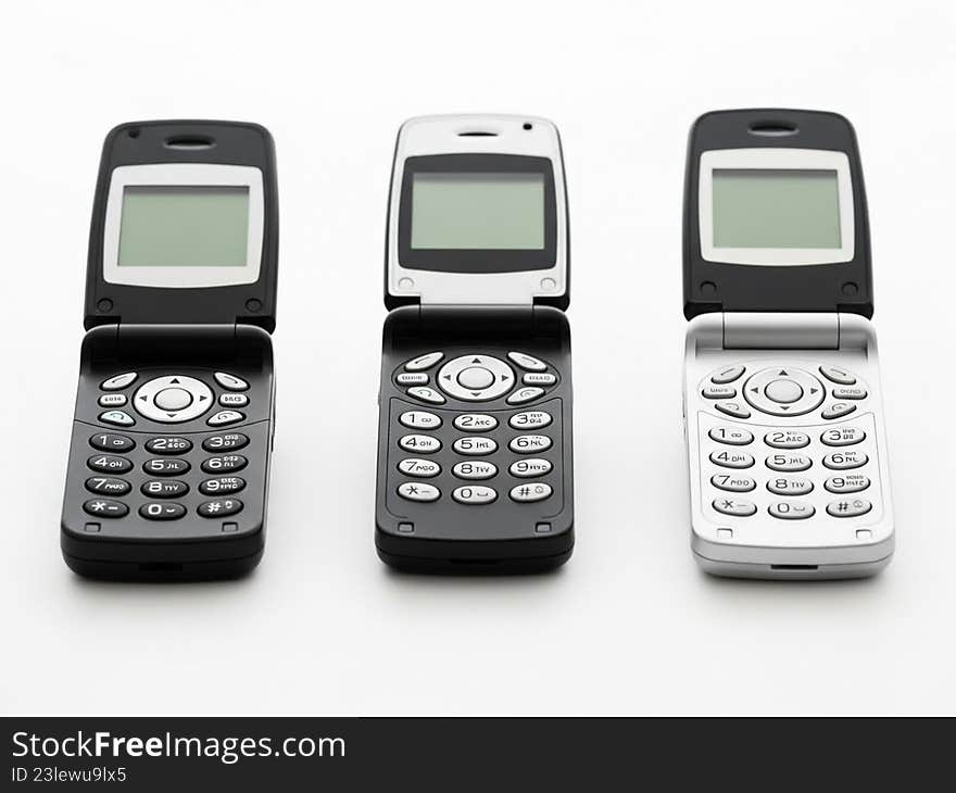 Three vintage mobile phones
