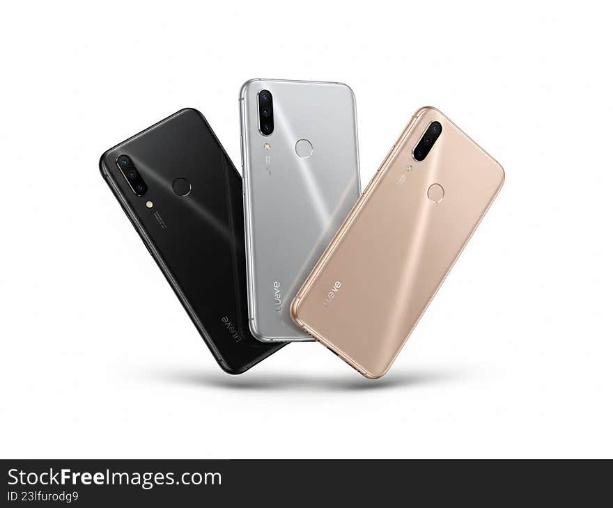 Three smartphones in different colors