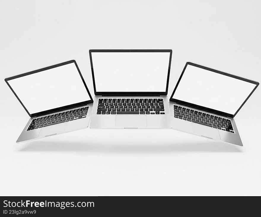 Three laptops in a row