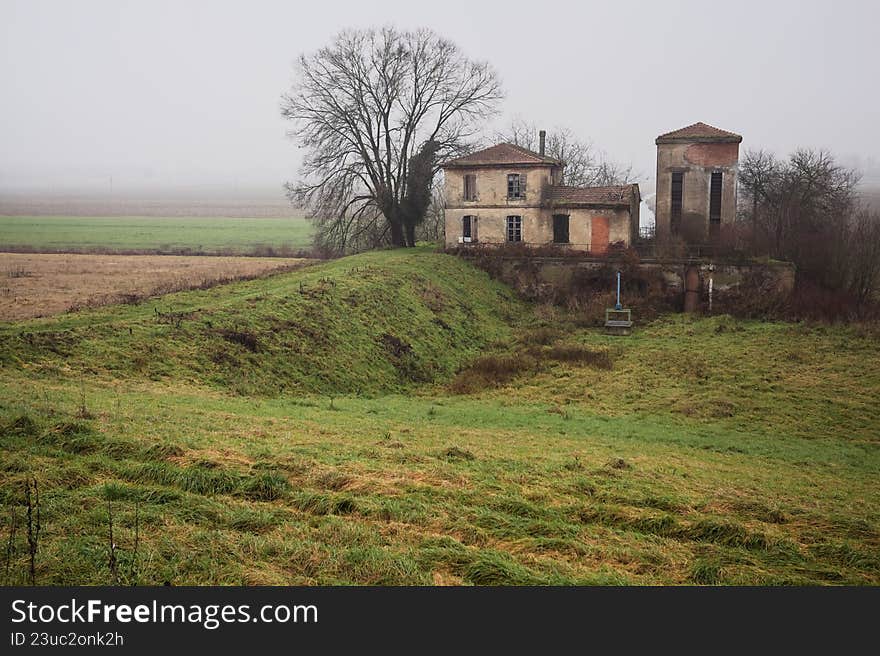 Abandoned building in a field