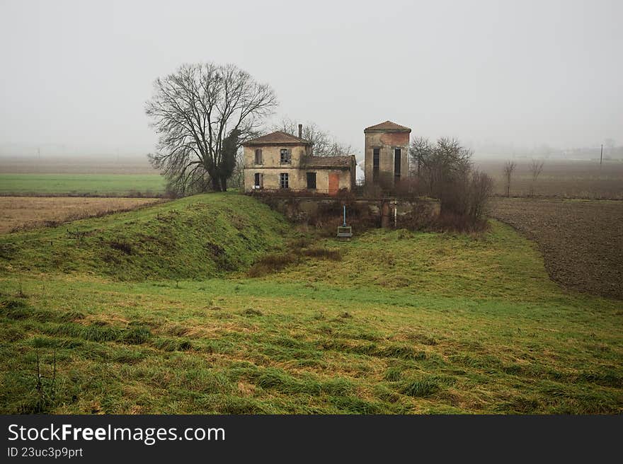 Abandoned building in a field