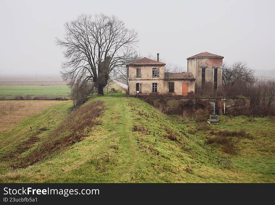 Abandoned building in a field