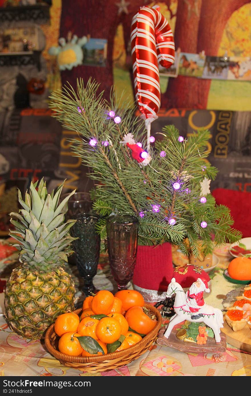Festive New Year's table with decorations and snacks