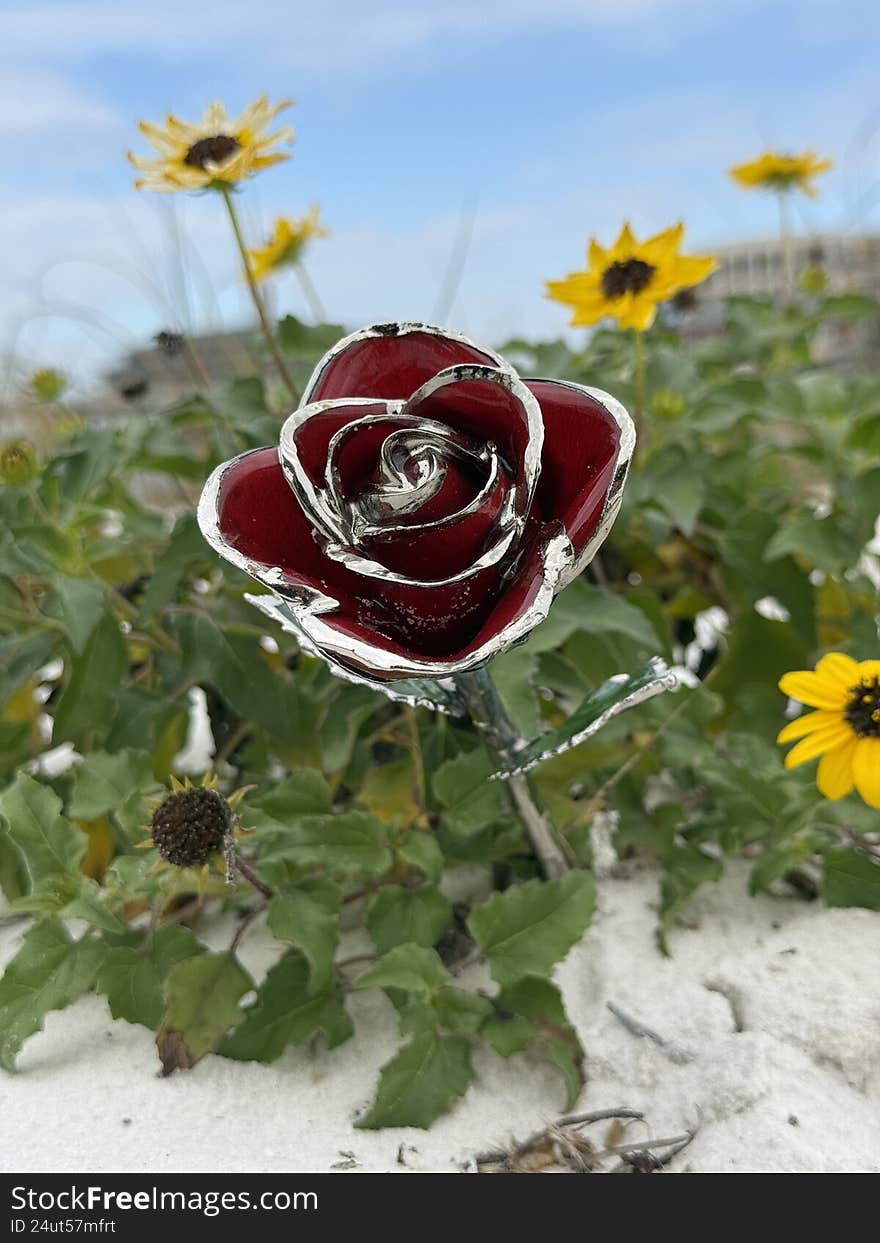 Faux rose with yellow beach sunflowers