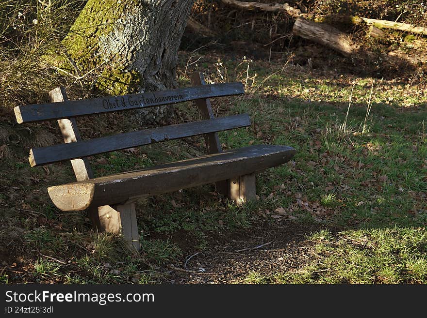 wooden bench on the promenade near reichelsheim