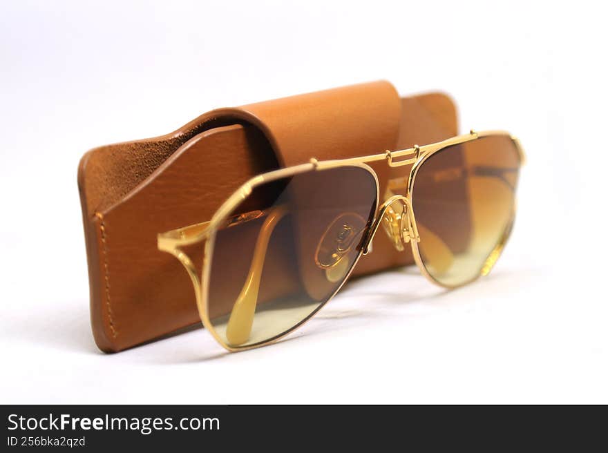 vintage aviator sunglasses with leather pauch side view.