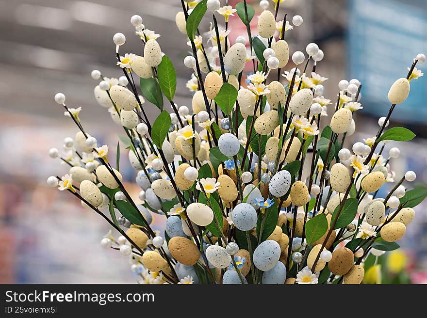 Easter decorative branches with pastel eggs