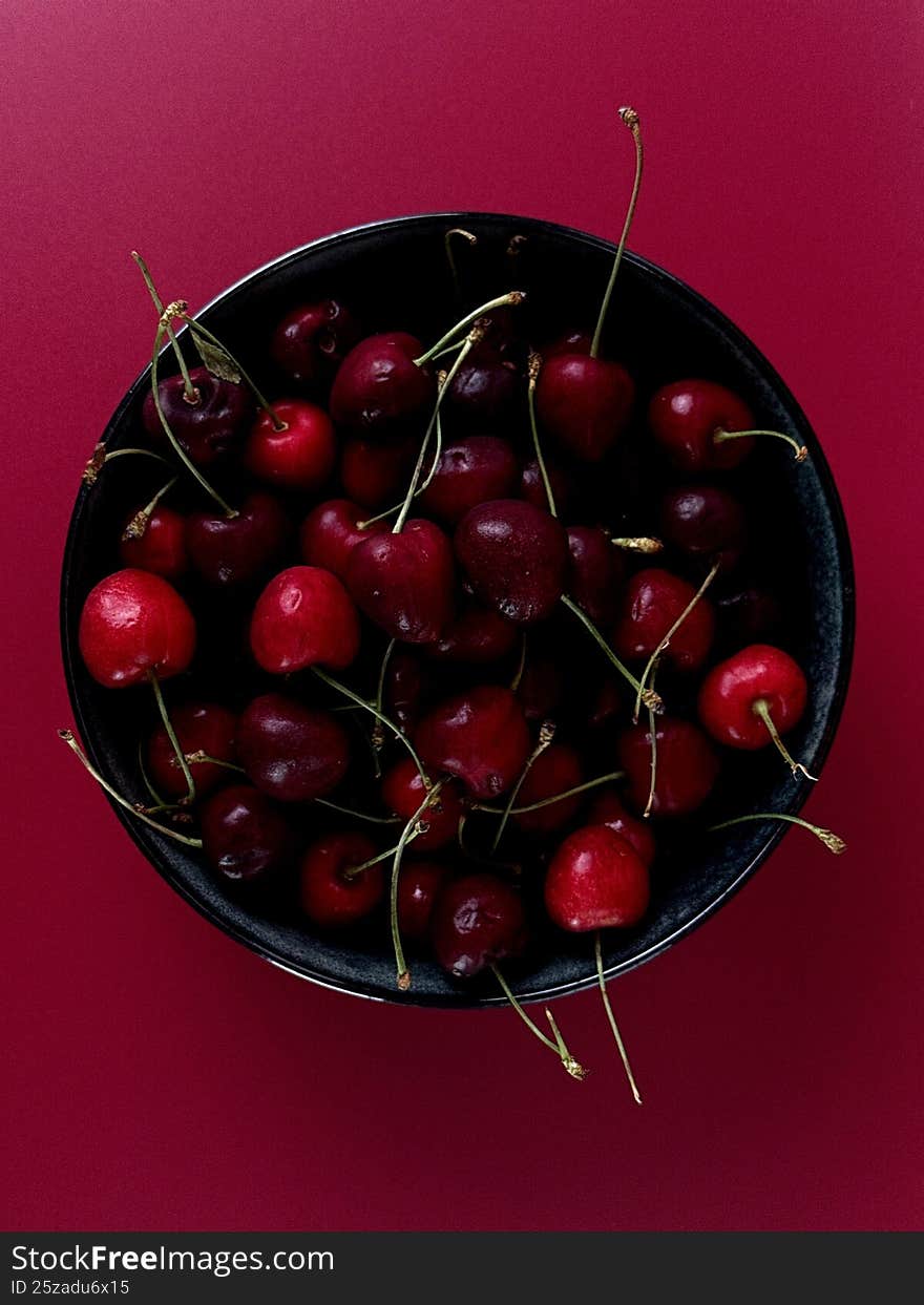 Red juice cherries in a bowl