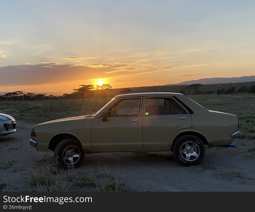 Sunset over a classic Datsun 120
