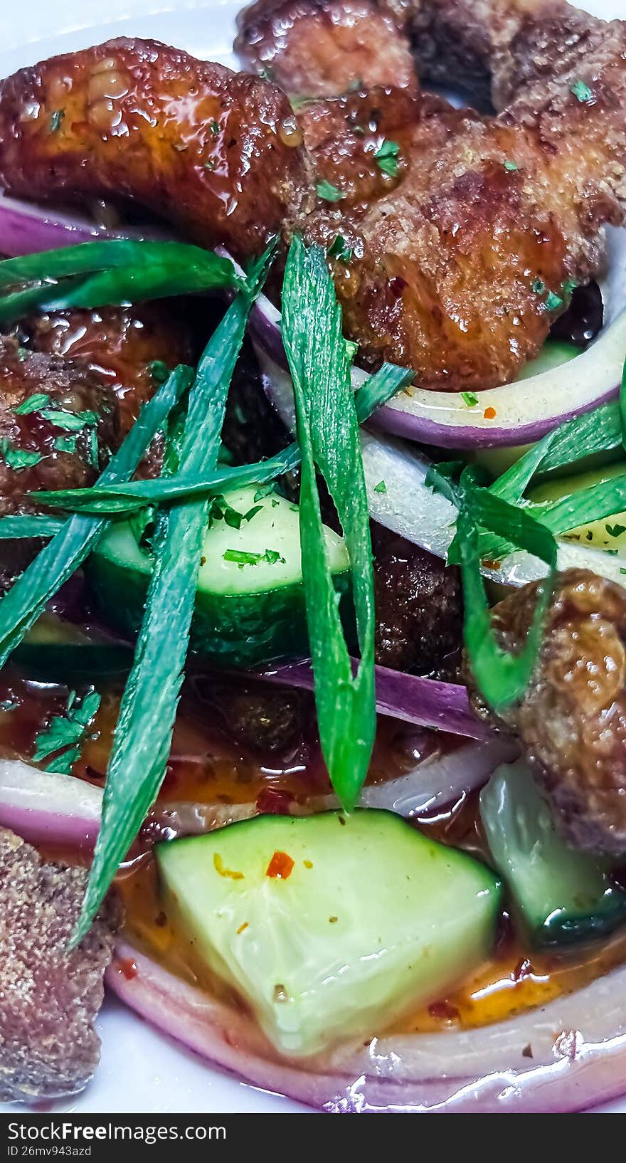 A mouth-watering study of texture and light. These wings are tossed in a rich, amber honey glaze that catches the warm indoor glow while the snow falls outside. Garnished with toasted sesame seeds and fresh scallions, this shot perfectly captures the soul-warming comfort of a winter night in the Ottawa Valley.