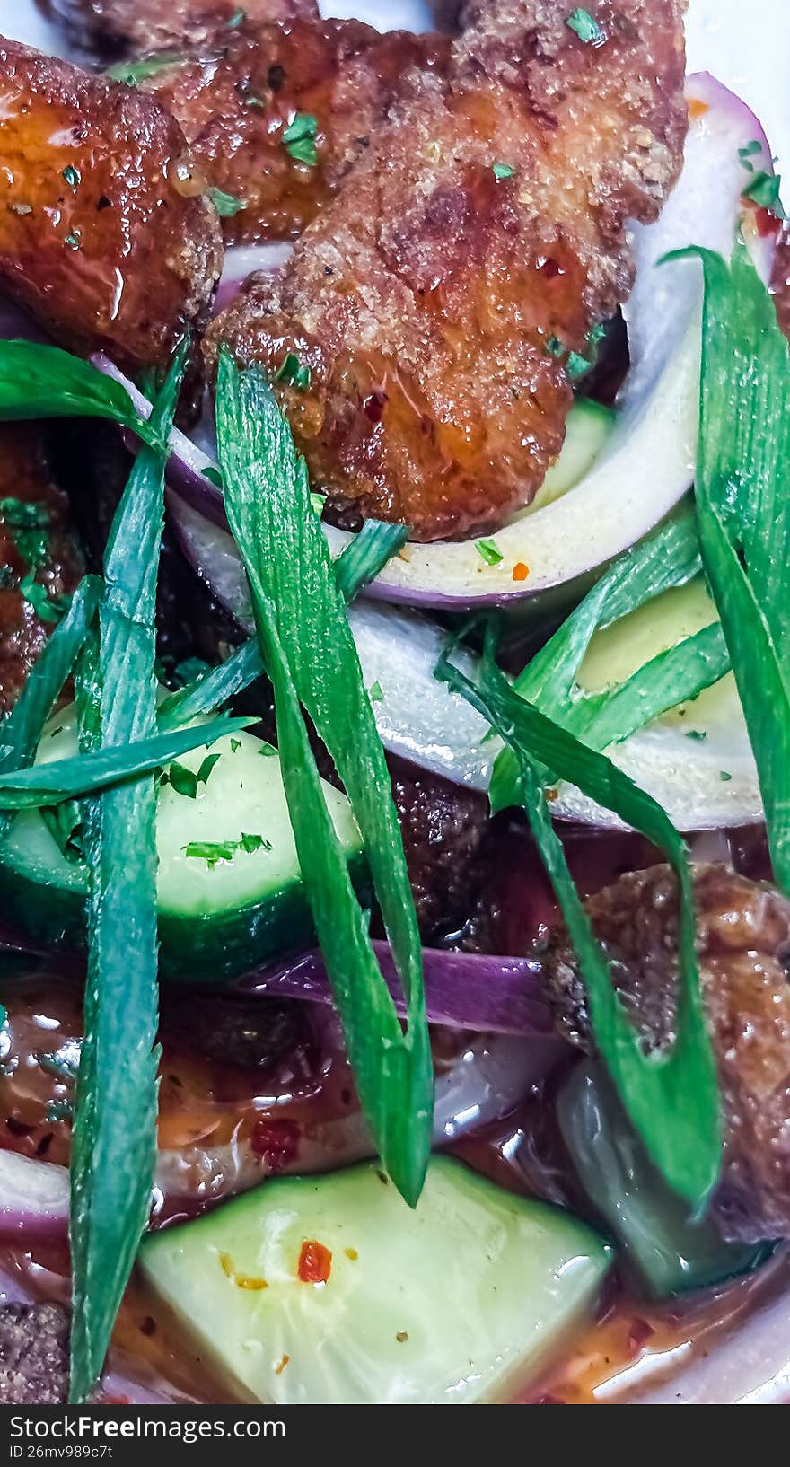 A mouth-watering study of texture and light. These wings are tossed in a rich, amber honey glaze that catches the warm indoor glow while the snow falls outside. Garnished with toasted sesame seeds and fresh scallions, this shot perfectly captures the soul-warming comfort of a winter night in the Ottawa Valley.